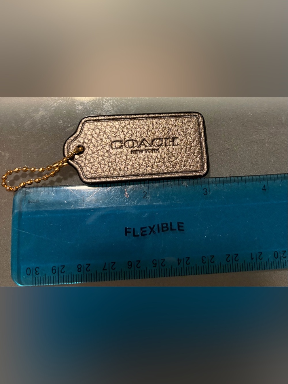 Coach hang tag